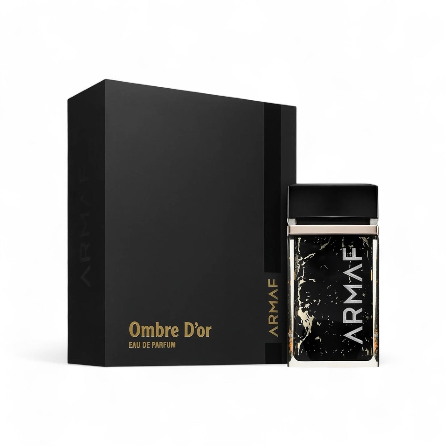 Orijent Parfimerija Ombre D'Or Eau de Parfum in a black marble effect bottle with gold accents and a black box.